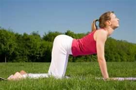 woman doing cow pose